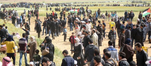 Des Palestiniens lors de l'action de protestation à la frontière de la Bande de Gaza et Israël (archives photo) - Sputnik Afrique