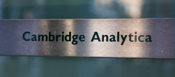 A Cambridge Analytica sign is pictured at the entrance of the building which houses the offices of Cambridge Analytica, in central London - Sputnik Afrique