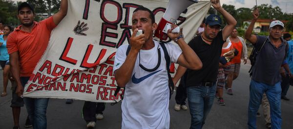 Une caravane de migrants d’Amérique centrale se dirige vers les États-Unis - Sputnik Afrique