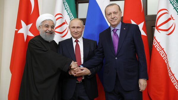 Les Présidents russe, turc et iranien, Vladimir Poutine, Recep Tayyip Erdogan et Hassan Rohani - Sputnik Afrique