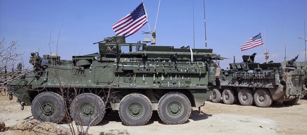 This Tuesday, March 7, 2017 frame grab from video provided by Arab 24 network, shows U.S. forces take up positions on the outskirts of the Syrian town, Manbij, a flashpoint between Turkish troops and allied Syrian fighters and U.S.-backed Kurdish fighters, in al-Asaliyah village, Aleppo province, Syria - Sputnik Afrique