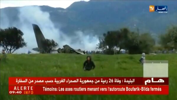 A grab from a video brodcast by Algeria's Ennahar satellite television channel on April 11, 2018 shows the scene of the crash of a transport plane, carrying around 100 Algerian army personnel on board. - Sputnik Afrique