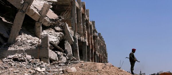 Un combatiente sirio en Guta Oriental - Sputnik Afrique