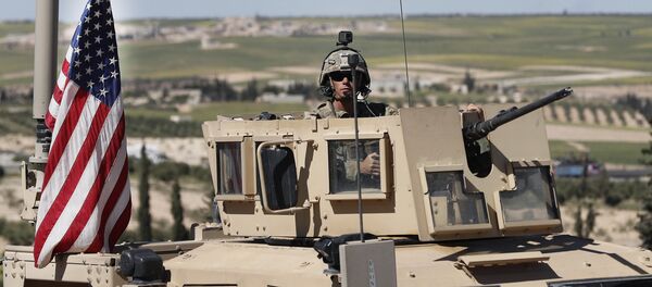 Un soldat américain à la frontière syrienne - Sputnik Afrique