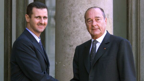 (FILES) In this file photo taken on June 25, 2001 Syrian President Bashar al-Assad (L) is greeted by French President Jacques Chirac before their meeting at the Elysee Palace in Paris. - Sputnik Afrique