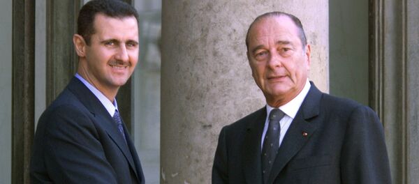 (FILES) In this file photo taken on June 25, 2001 Syrian President Bashar al-Assad (L) is greeted by French President Jacques Chirac before their meeting at the Elysee Palace in Paris. - Sputnik Afrique