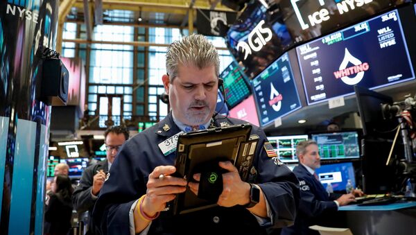 The Dow Jones Industrial average is displayed on a screen after the closing bell at the New York Stock Exchange, (NYSE) in New York, U.S., April 10, 2018. - Sputnik Afrique