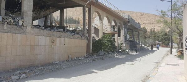 Исследовательский центр в Сирии, разрушенный в результате авиаударов коалиции США и их союзников - Sputnik Afrique