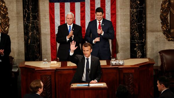 French President Emmanuel Macron acknowledges applause after addressing a joint meeting of Congress in the House chamber of the U.S. Capitol in Washington, U.S., April 25, 2018. - Sputnik Afrique