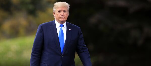 In this Friday, Oct. 13, 2017, file photo, President Donald Trump walks towards reporters on the South Lawn of the White House in Washington In this Friday, Oct. 13, 2017, file photo, President Donald Trump walks towards reporters on the South Lawn of the White House in Washington - Sputnik Afrique