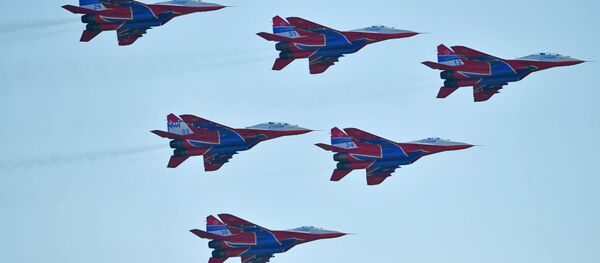Les MiG-29 du groupe de voltige aérienne russe Striji Les MiG-29 du groupe de voltige aérienne russe Striji - Sputnik Afrique