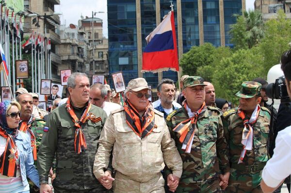 la marche du Régiment immortel en Syrie  - Sputnik Afrique