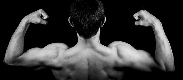 Un homme musclé, image d'illustration - Sputnik Afrique