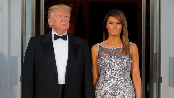 El presidente de EEUU, Donald Trump y su esposa, Melania - Sputnik Afrique