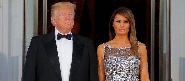 El presidente de EEUU, Donald Trump y su esposa, Melania - Sputnik Afrique