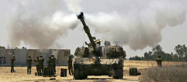 An Israeli army tank fires towards the Gaza Strip (File) - Sputnik Afrique