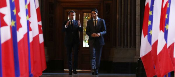 Macron et Trudeau - Sputnik Afrique