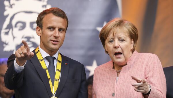 Der französische Präsident Emmanuel Macron (l.) und Bundeskanzlerin Angela Merkel (Archivbild) - Sputnik Afrique