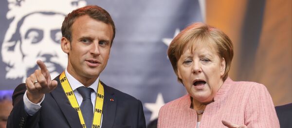 Der französische Präsident Emmanuel Macron (l.) und Bundeskanzlerin Angela Merkel (Archivbild) - Sputnik Afrique
