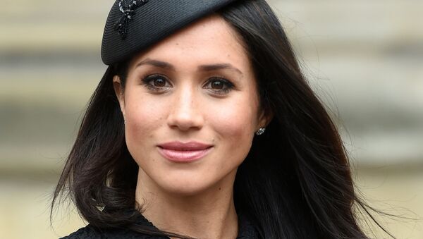 Meghan Markle, the fiancee of Britain's Prince Harry, attends a Service of Thanksgiving and Commemoration on ANZAC Day at Westminster Abbey in London - Sputnik Afrique