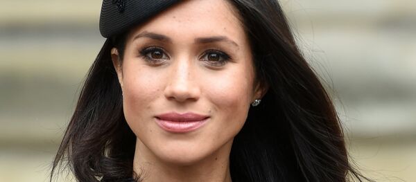 Meghan Markle, the fiancee of Britain's Prince Harry, attends a Service of Thanksgiving and Commemoration on ANZAC Day at Westminster Abbey in London - Sputnik Afrique