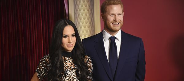le prince Harry et Meghan Markle - Sputnik Afrique