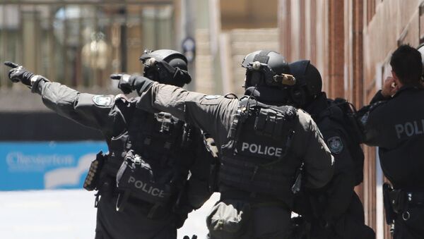 Des policiers armés à Sydney, en Australie - Sputnik Afrique