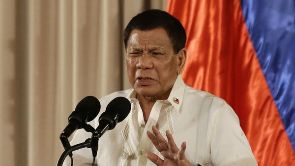 In this Aug. 16, 2017, photo, Philippine President Rodrigo Duterte gestures during the 19th Founding Anniversary of the Volunteers Against Crime and Corruption at the Malacanang Presidential Palace in Manila, Philippines. - Sputnik Afrique