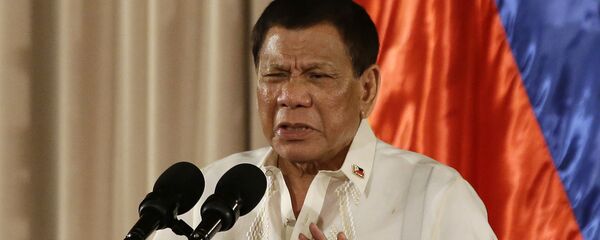 In this Aug. 16, 2017, photo, Philippine President Rodrigo Duterte gestures during the 19th Founding Anniversary of the Volunteers Against Crime and Corruption at the Malacanang Presidential Palace in Manila, Philippines. - Sputnik Afrique