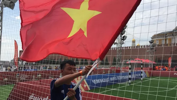 La place Rouge accueille un match de foot disputé par de jeunes Vietnamiens - Sputnik Afrique