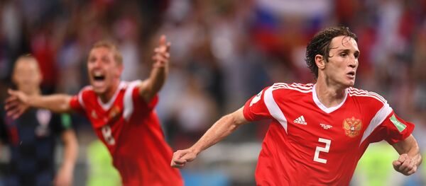 Les membres de l'équipe russe Yuri Gazinski et Mario Fernandez lors d'un match du Mondial 2018 - Sputnik Afrique