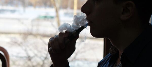 Une cigarette électronique - Sputnik Afrique