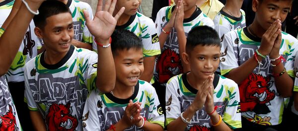 Enfants rescapés en Thaïlande - Sputnik Afrique