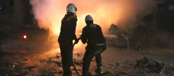 Aktywiści ruchu Białe Hełmy w prowincji Idlib, Syria. Zdjęcie archiwalne - Sputnik Afrique