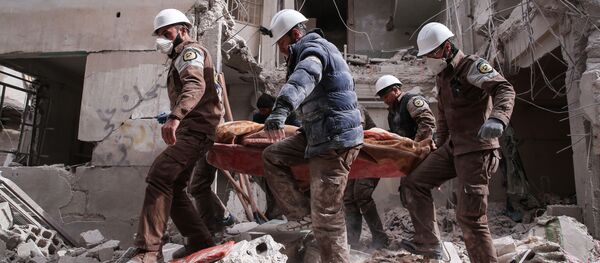 Białe hełmy na przedmieściach Damaszku - Sputnik Afrique