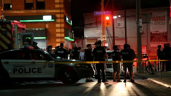 La police canadienne près de la scène d'une fusillade à Toronto - Sputnik Afrique