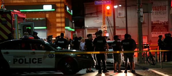 La police canadienne près de la scène d'une fusillade à Toronto - Sputnik Afrique