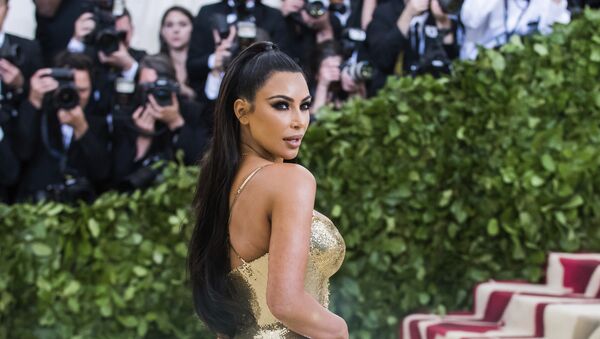 Kim Kardashian attends The Metropolitan Museum of Art's Costume Institute benefit gala celebrating the opening of the Heavenly Bodies: Fashion and the Catholic Imagination exhibition on Monday, May 7, 2018, in New York - Sputnik Afrique