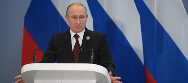 Vladimir Poutine à la conférence de presse à l'issue du sommet des BRICS à Johannesburg, le 27 juillet 2018 Vladimir Poutine à la conférence de presse à l'issue du sommet des BRICS à Johannesburg, le 27 juillet 2018 - Sputnik Afrique