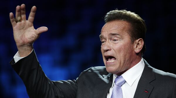 Former California Gov. Arnold Schwarzenegger delivers his speech at the One Planet Summit, in Boulogne-Billancourt, near Paris, France, Tuesday, Dec. 12, 2017. World leaders, investment funds and energy magnates promised to devote new money and technology to slow global warming at a summit in Paris that President Emmanuel Macron hopes will rev up the Paris climate accord that U.S. President Donald Trump has rejected - Sputnik Afrique