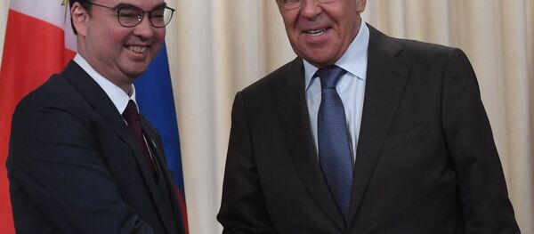 Sergueï Lavrov et Alan Peter Cayetano - Sputnik Afrique