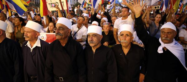Leaders from the Druze minority together with others take part in a rally to protest against Jewish nation-state law in Rabin square in Tel Aviv, Israel, August 4, 2018. - Sputnik Afrique