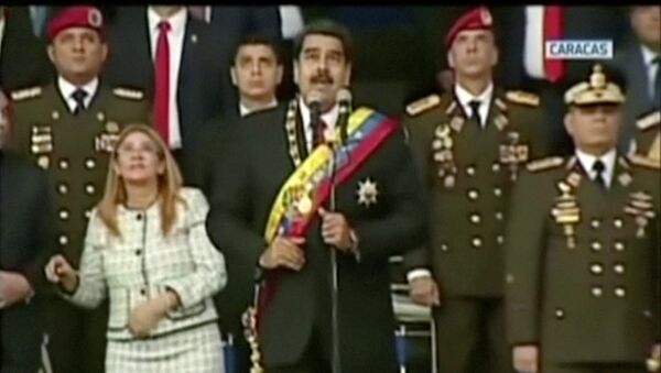 Venezuelan President Nicolas Maduro reacts during an event which was interrupted, in this still frame taken from video August 4, 2018, Caracas, Venezuela - Sputnik Afrique