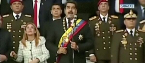 Venezuelan President Nicolas Maduro reacts during an event which was interrupted, in this still frame taken from video August 4, 2018, Caracas, Venezuela - Sputnik Afrique