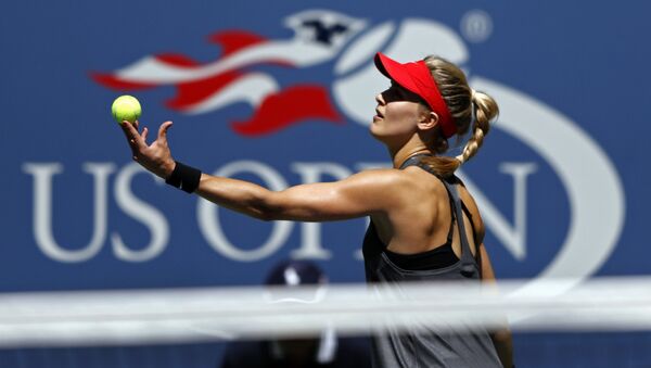 Eugenie Bouchard, of Canada, serves to Evgeniya Rodina, of Russia, during the first round of the U.S. Open tennis tournament, Wednesday, Aug. 30, 2017, in New York - Sputnik Afrique