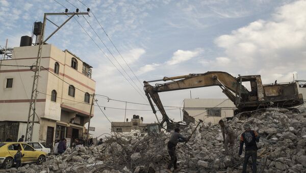 Un immeuble détruit dans la bande de Gaza - Sputnik Afrique