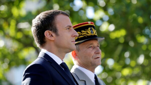 French President Emmanuel Macron (L) and Chief of the Defence Staff, French Army General Pierre de Villiers arrive for the annual Bastille Day military parade on the Champs-Elysees in Paris, France, July 14, 2017. - Sputnik Afrique