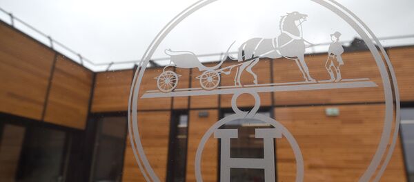 The new Hermes (La Manufacture de l'Allan Hermès) logo is pictured in the new leather goods workshop of French high fashion luxury goods manufacturer Hermes (La Manufacture de l'Allan Hermès), on the eve of its inauguration day, on April 5, 2018 in Allenjoie, northeastern France. - Sputnik Afrique