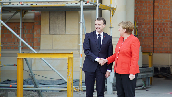 Emmanuel Macron et Angela Merkel - Sputnik Afrique