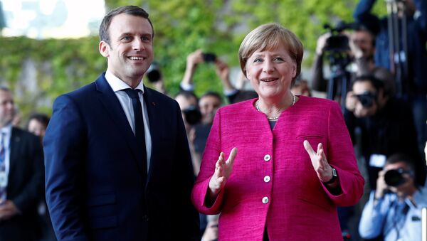 Emmanuel Macron et Angela Merkel - Sputnik Afrique
